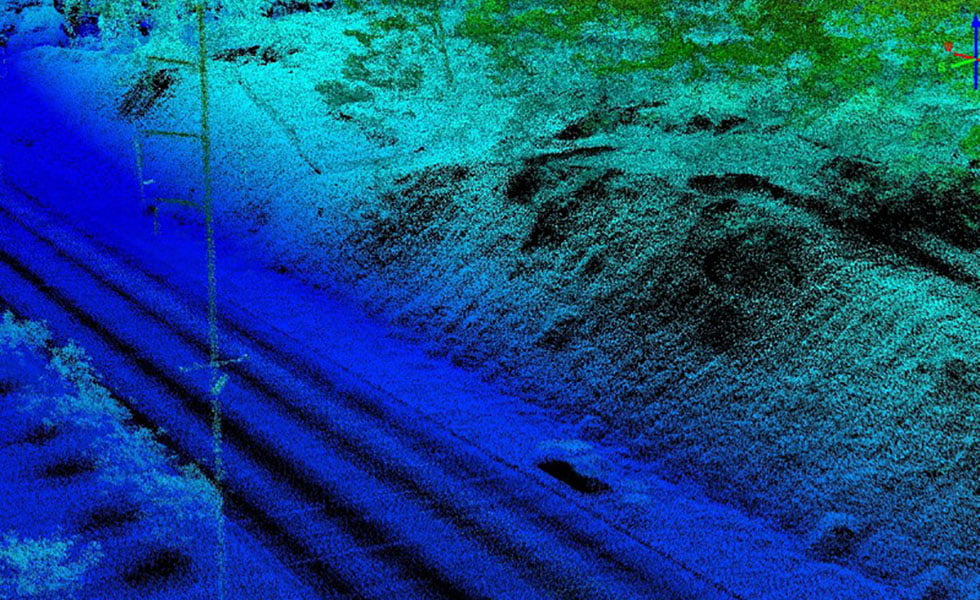Результат 3D-картографирования ночью участка шоссе и окружающего ландшафта с помощью LiDAR